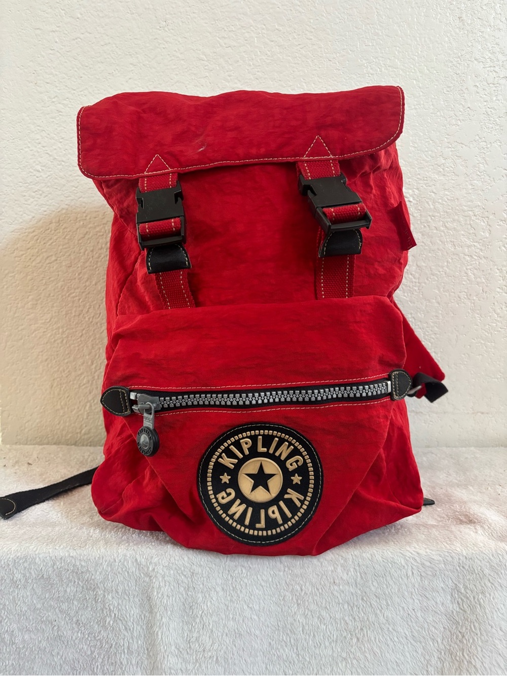 Vintage Kipling Red Canvas Roll-Top Backpack with Front Zip Pocket